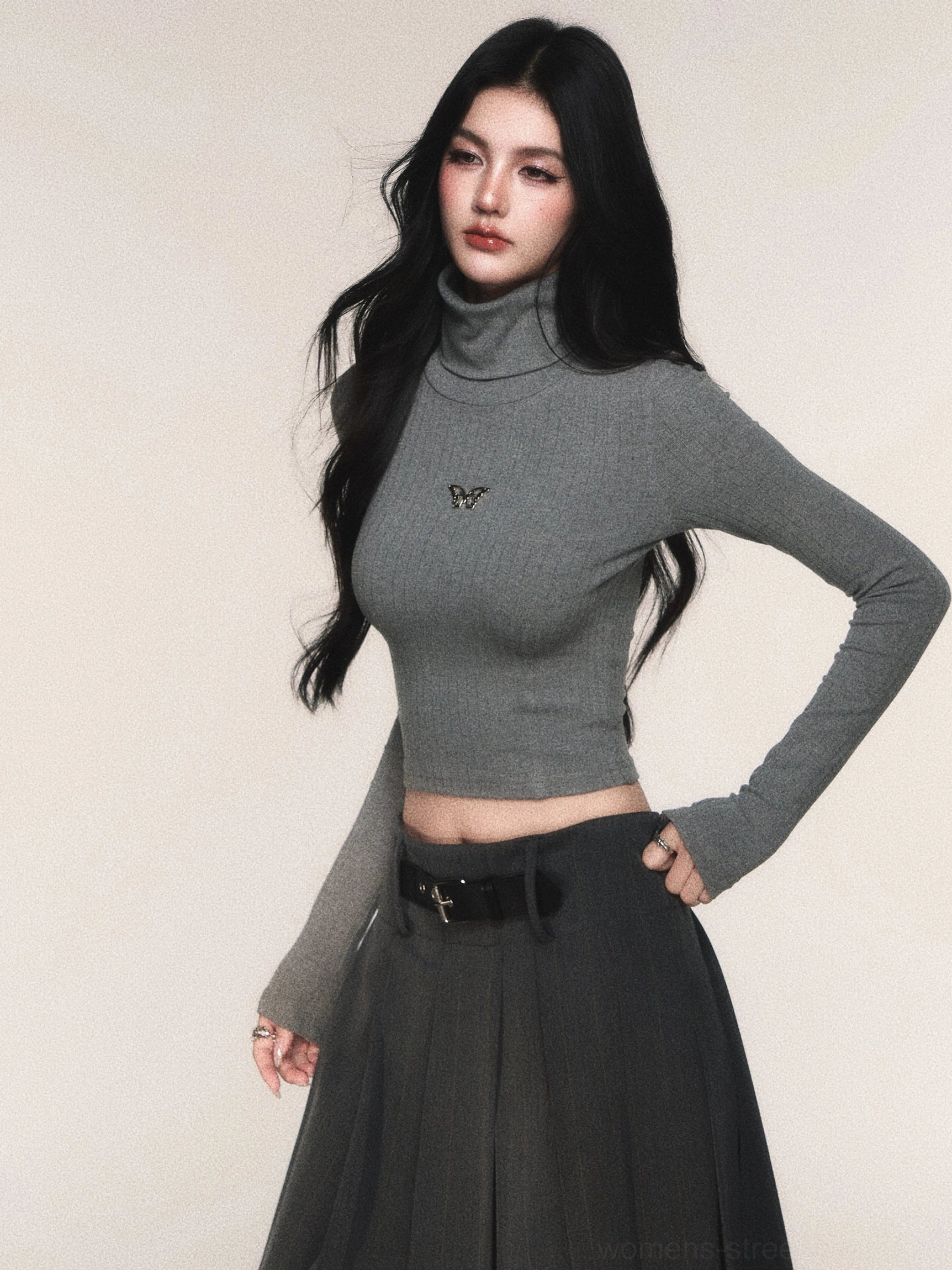 Butterfly Echo cropped turtleneck knit top in black and grey color options for women's Seoul streetwear styling