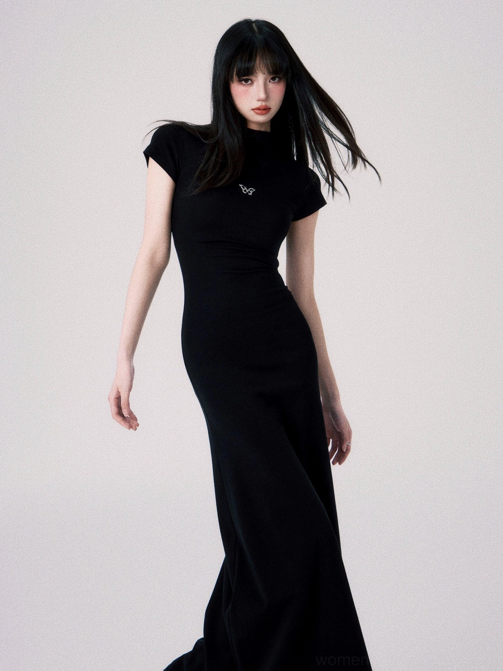 Butterfly emblem fitted maxi dress product image in a sleek bodycon silhouette with mock neck styling