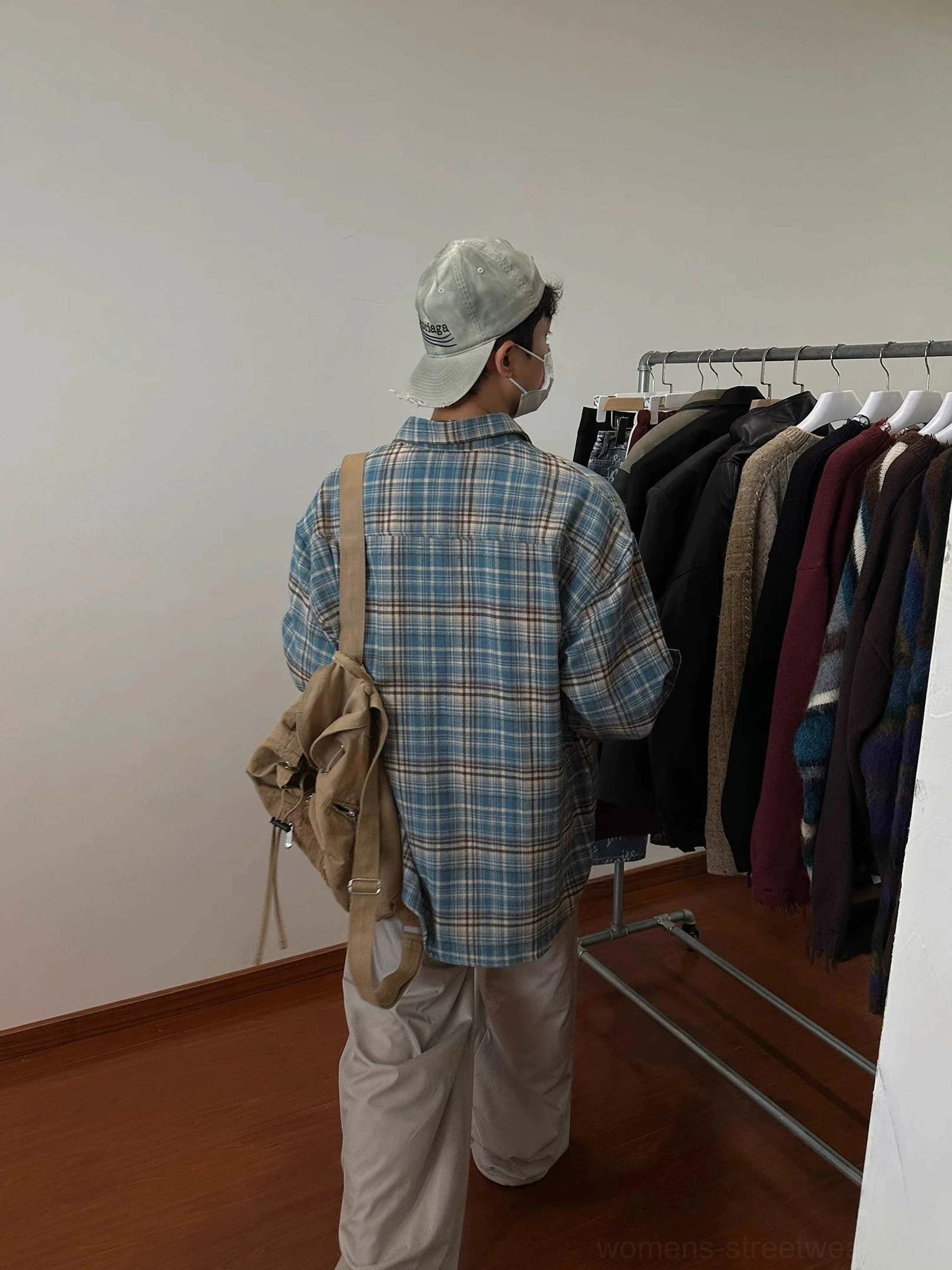 Button down oversized plaid shirt with long sleeves chest pocket and relaxed everyday streetwear fit