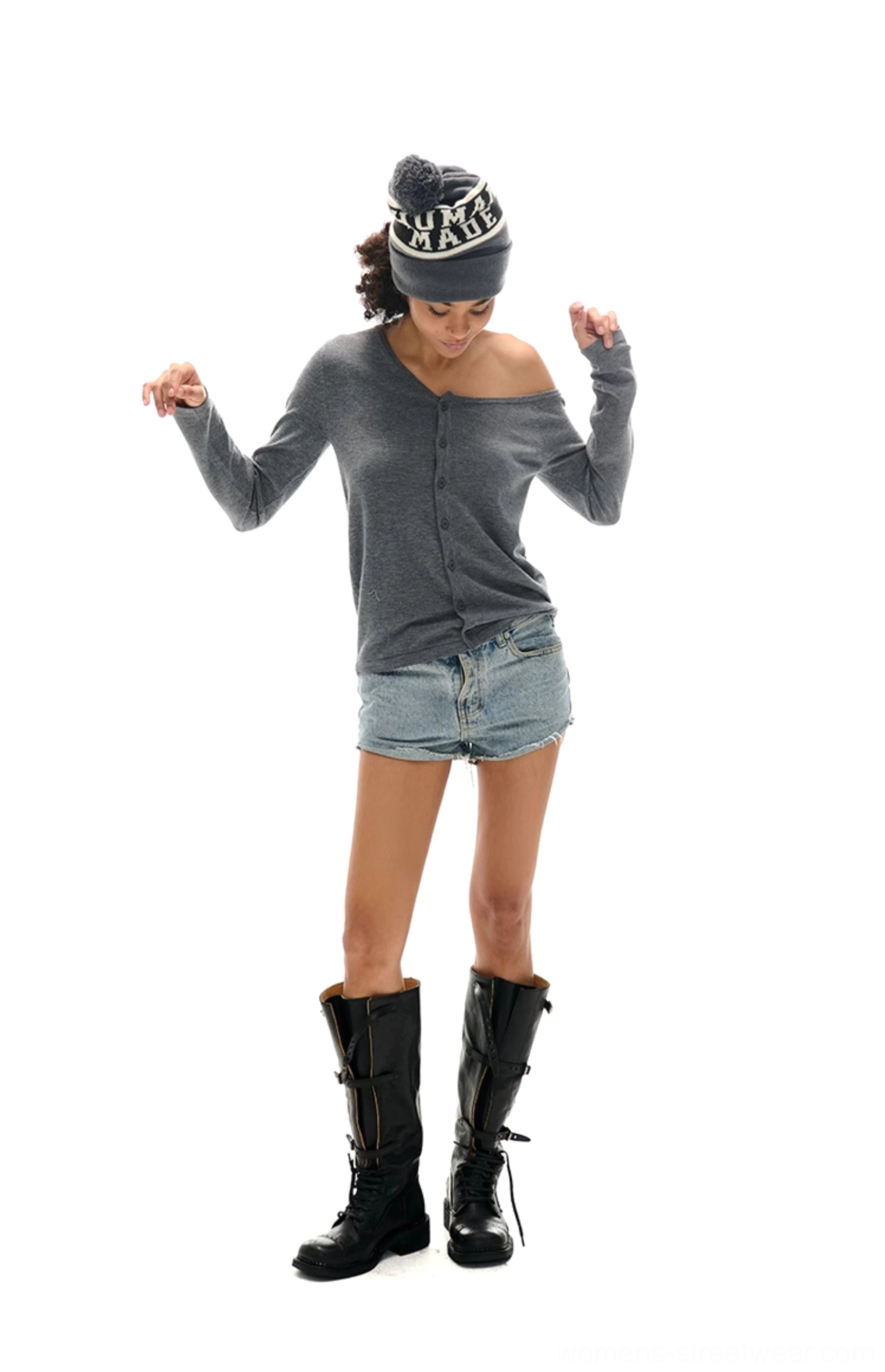 Button-front asymmetrical knit cardigan designed for layered urban fashion and everyday streetwear