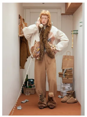 Camel kitty leopard patch wide leg streetwear pants front view in a retro apartment outfit