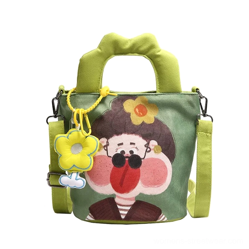 Inner slip pocket storage compartment of cartoon canvas tote revealing organizational design for small essentials and valuables