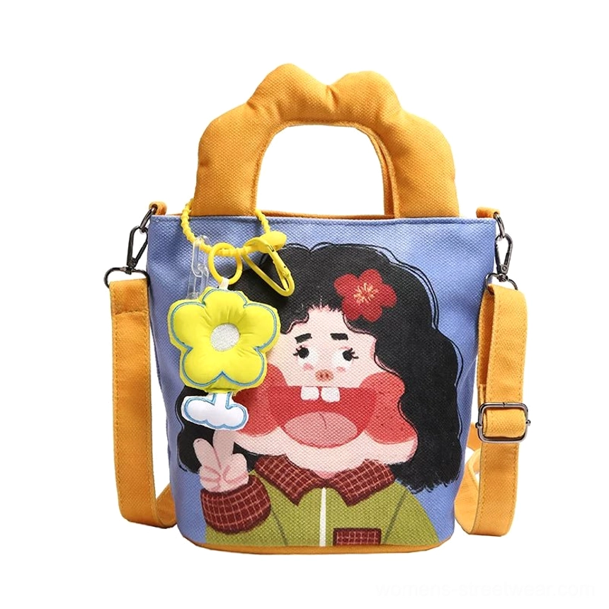 Magnetic snap closure hardware detail on cartoon canvas tote showing secure fastening mechanism for daily essentials protection