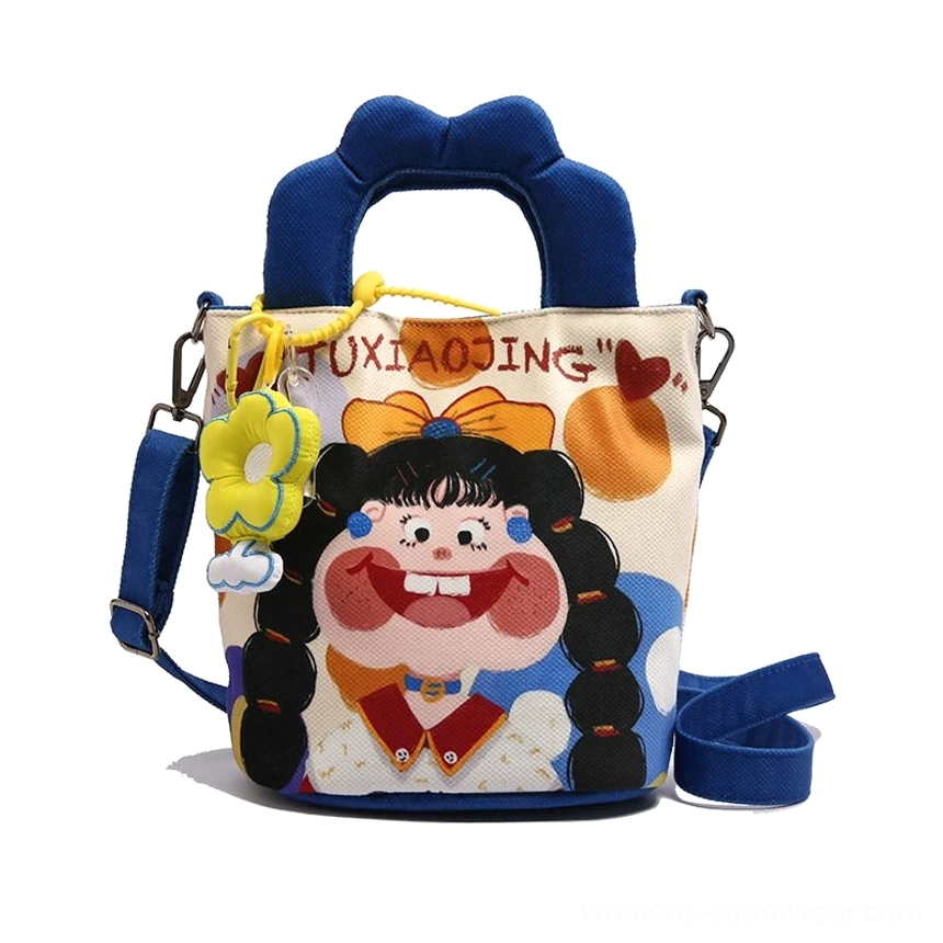 Cartoon tote styled with minimalist outfit showing how neutral base layers complement bold graphic cartoon character print
