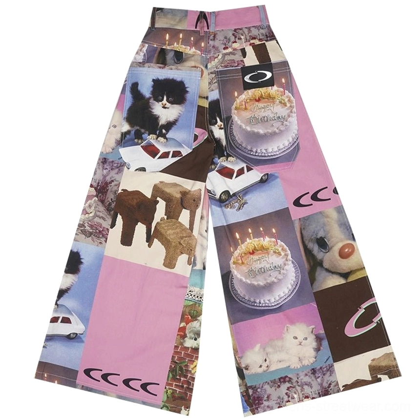 Flat lay front view of cat birthday cake patchwork print high-waist wide-leg streetwear pants in pink