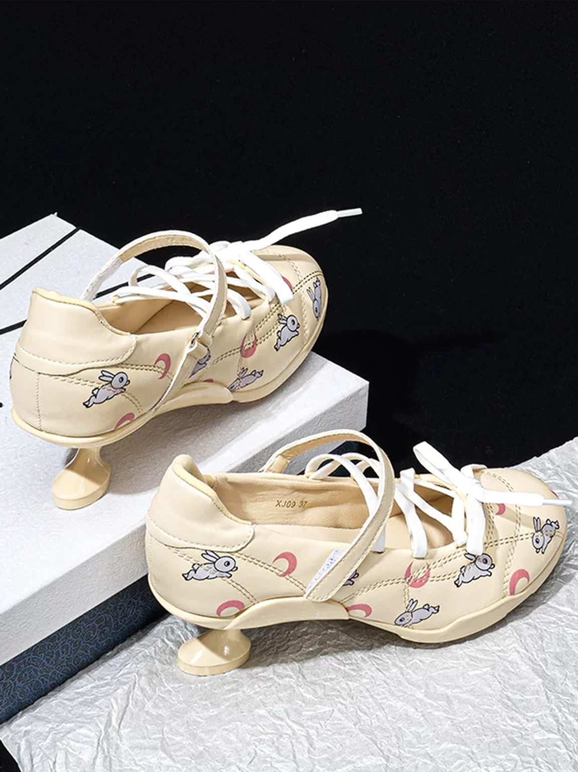 Celestial moon star low-heel sport Mary Janes sculpted heel and rubber outsole detail
