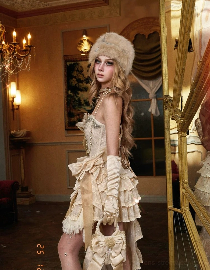 Champagne pearl handle bow mini handbag held with tiered ruffle dress and long satin gloves