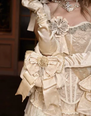 Champagne pearl handle rosette bow mini handbag styled with a vintage lace Lolita-inspired gown