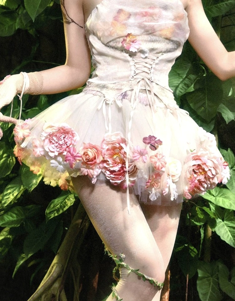 Front close-up of champagne pink floral tulle petticoat with hand-finished pink and peach 3D flower appliques