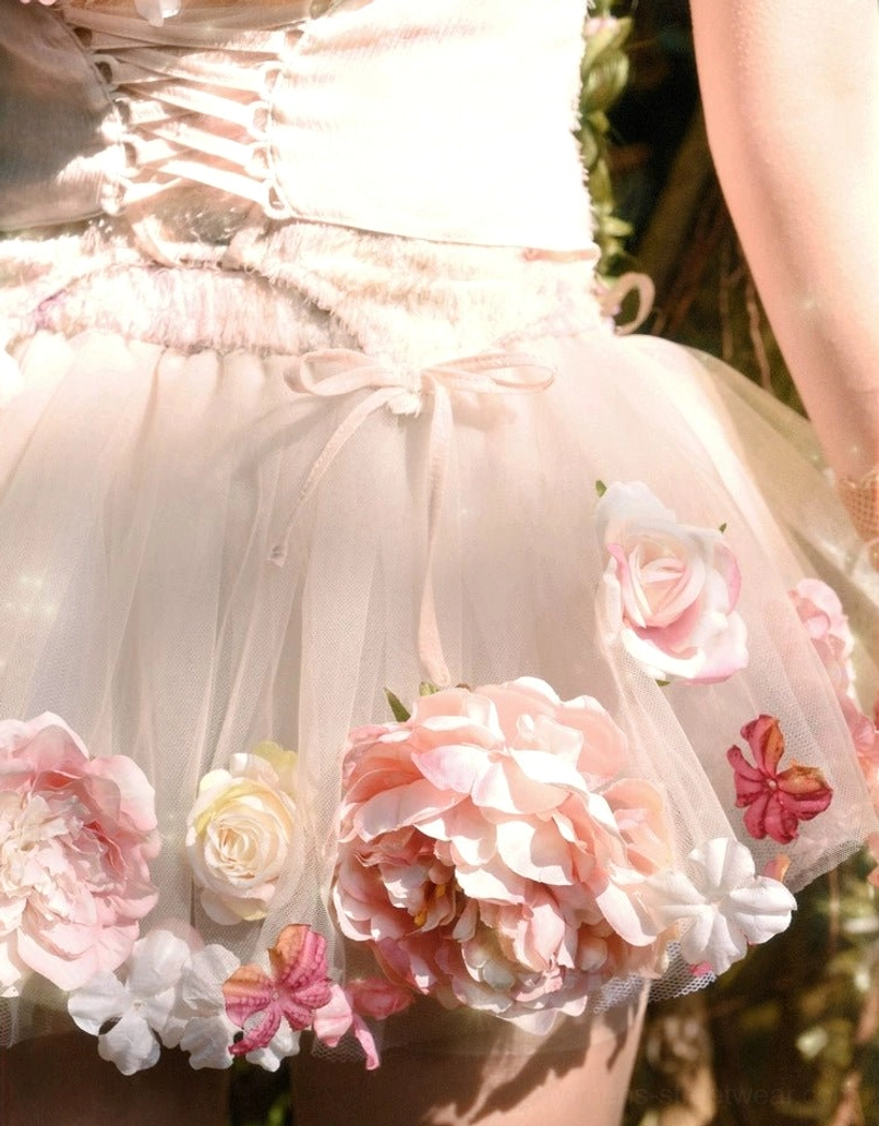 Voluminous floral tulle petticoat in champagne pink with layered sheer construction and 3D rose appliques