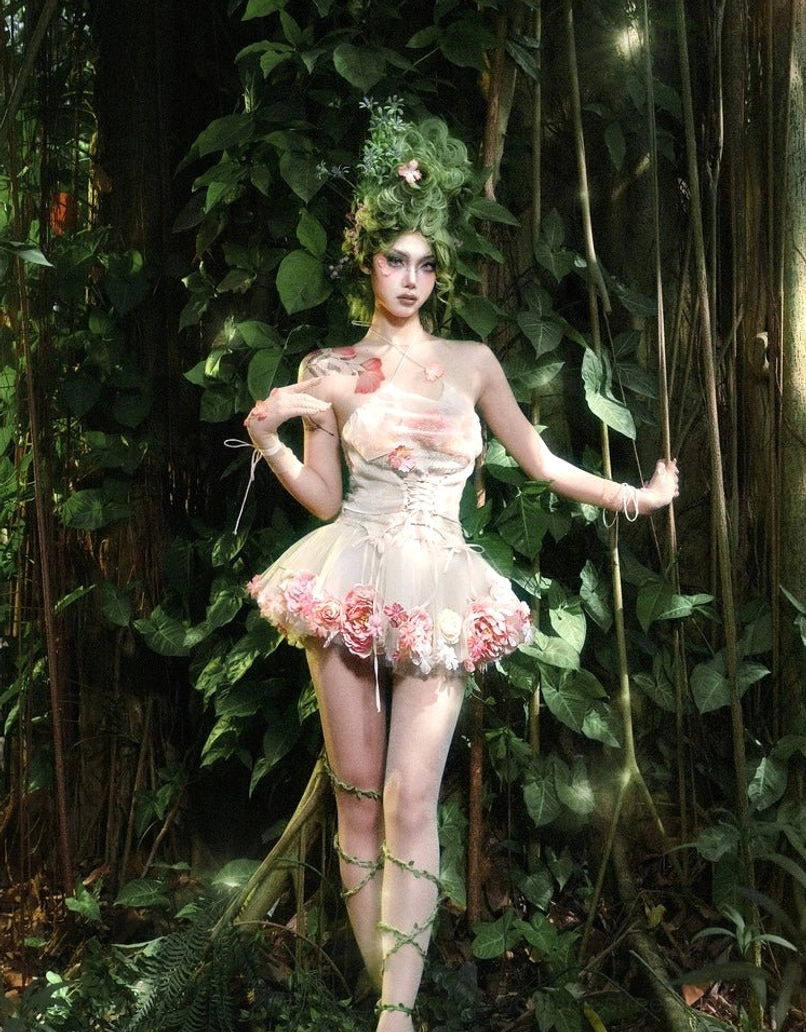 Hand-decorated champagne pink floral tulle petticoat with structured layered tulle and mixed rose appliques