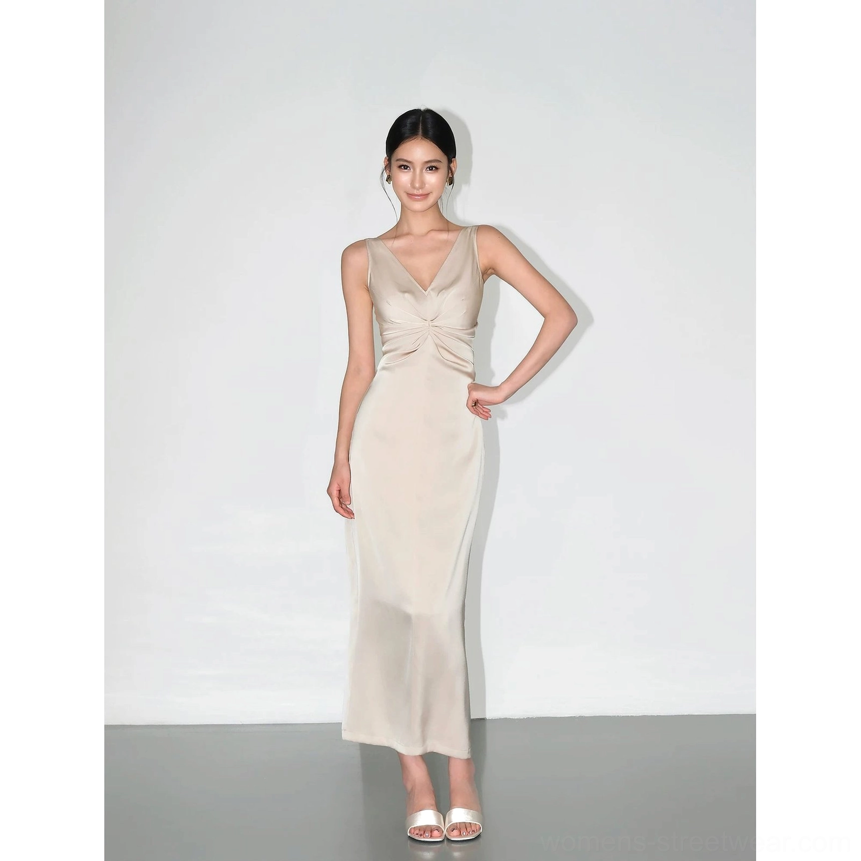 Champagne twist-front satin maxi dress product image with luminous sheen, feminine drape and sophisticated floor-length silhouette
