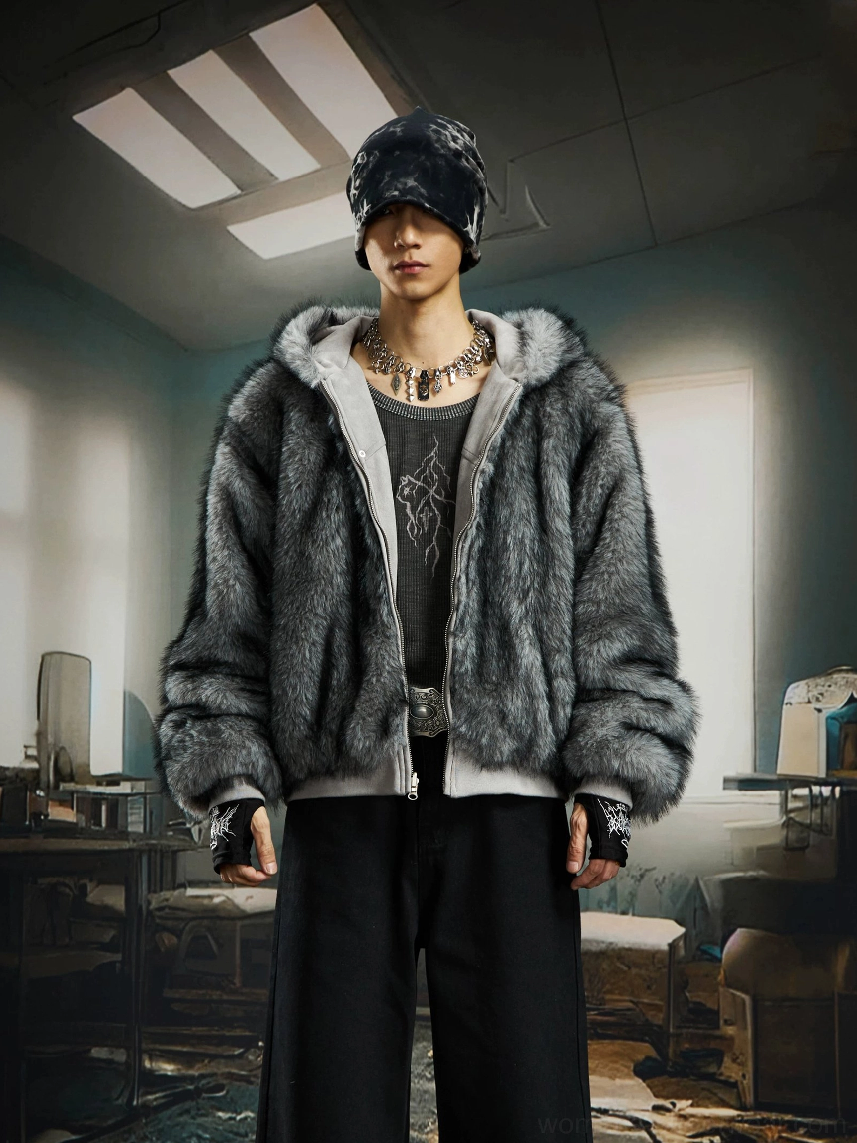 Male model wearing a charcoal faux fur reversible hooded bomber jacket with oversized drop shoulder streetwear fit