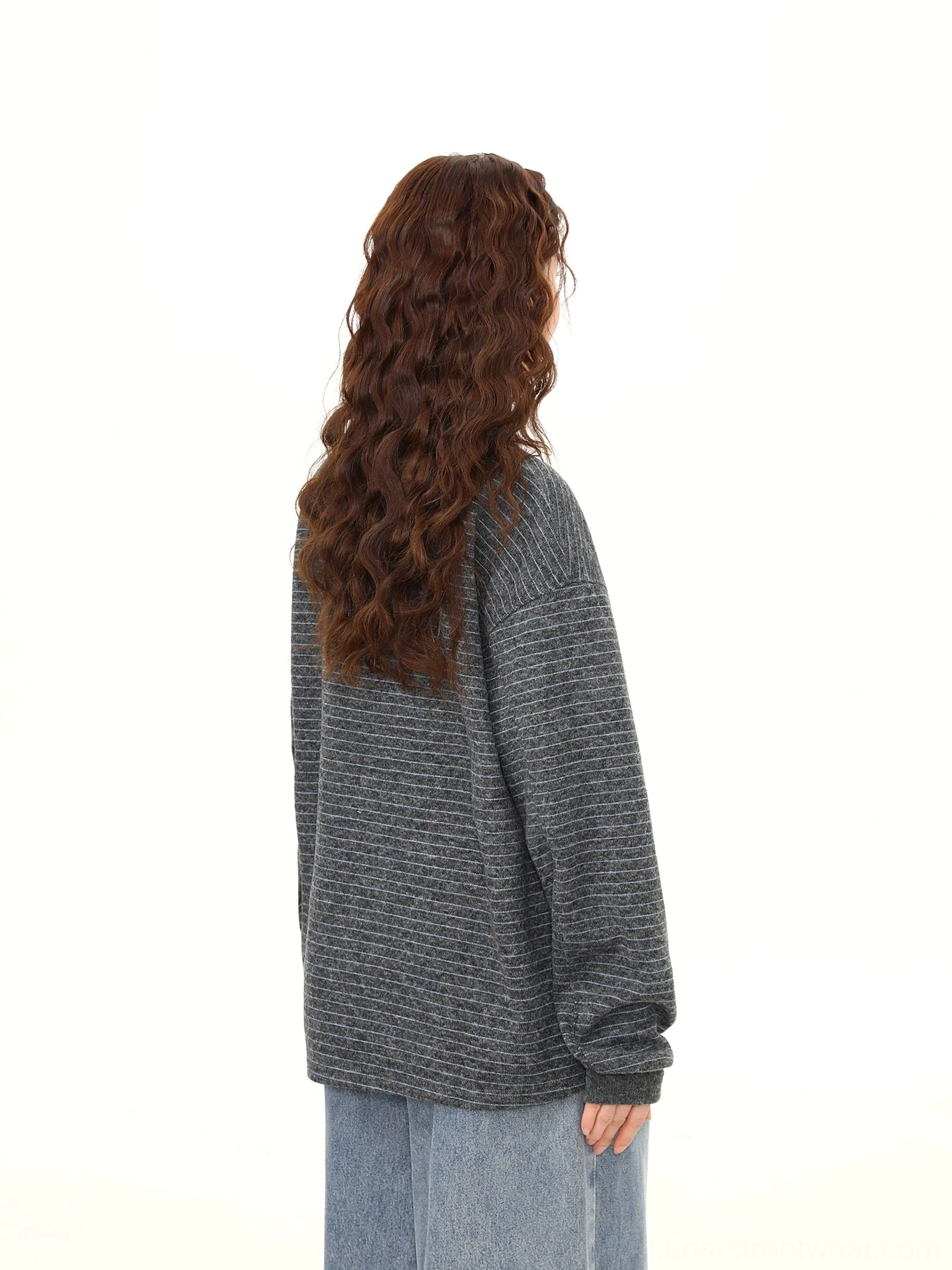 Back view of charcoal gray pinstripe oversized Henley knit pullover showing relaxed silhouette ribbed cuffs and straight hem