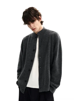 Charcoal stand collar brushed knit cardigan in relaxed Korean streetwear fit front three quarter studio view