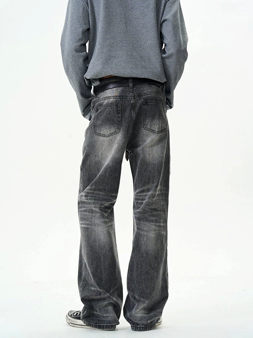 Back view of relaxed charcoal straight leg jeans showing classic rear pockets and faded denim wash marks