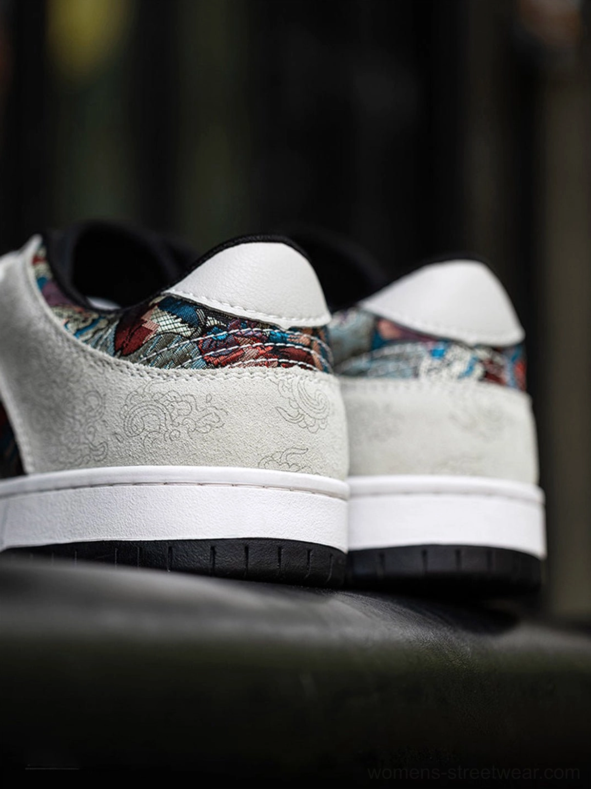 Chinese embroidered bird brocade streetwear court sneakers detailed product view with white textured upper and colorful side panels