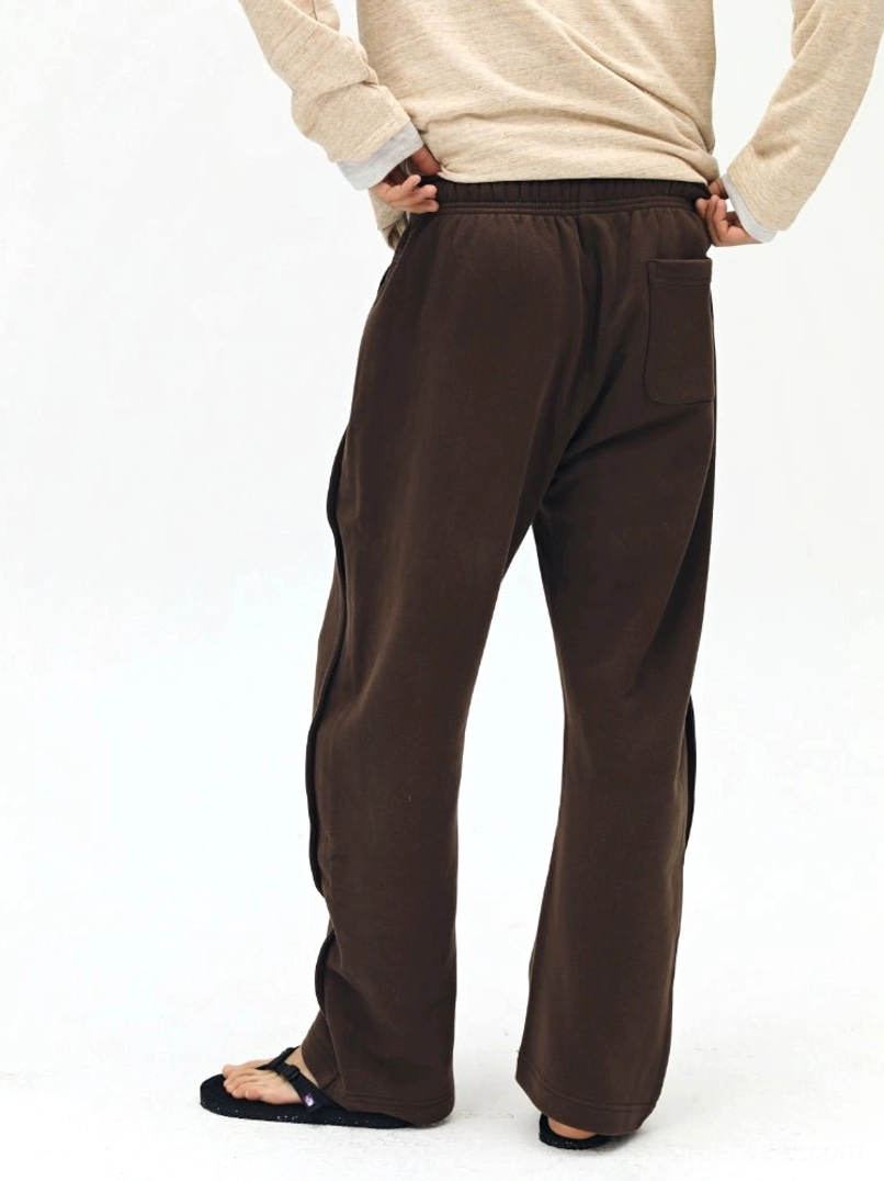 Chocolate brown drawstring sweatpants back view - back patch pocket detail with relaxed silhouette fit