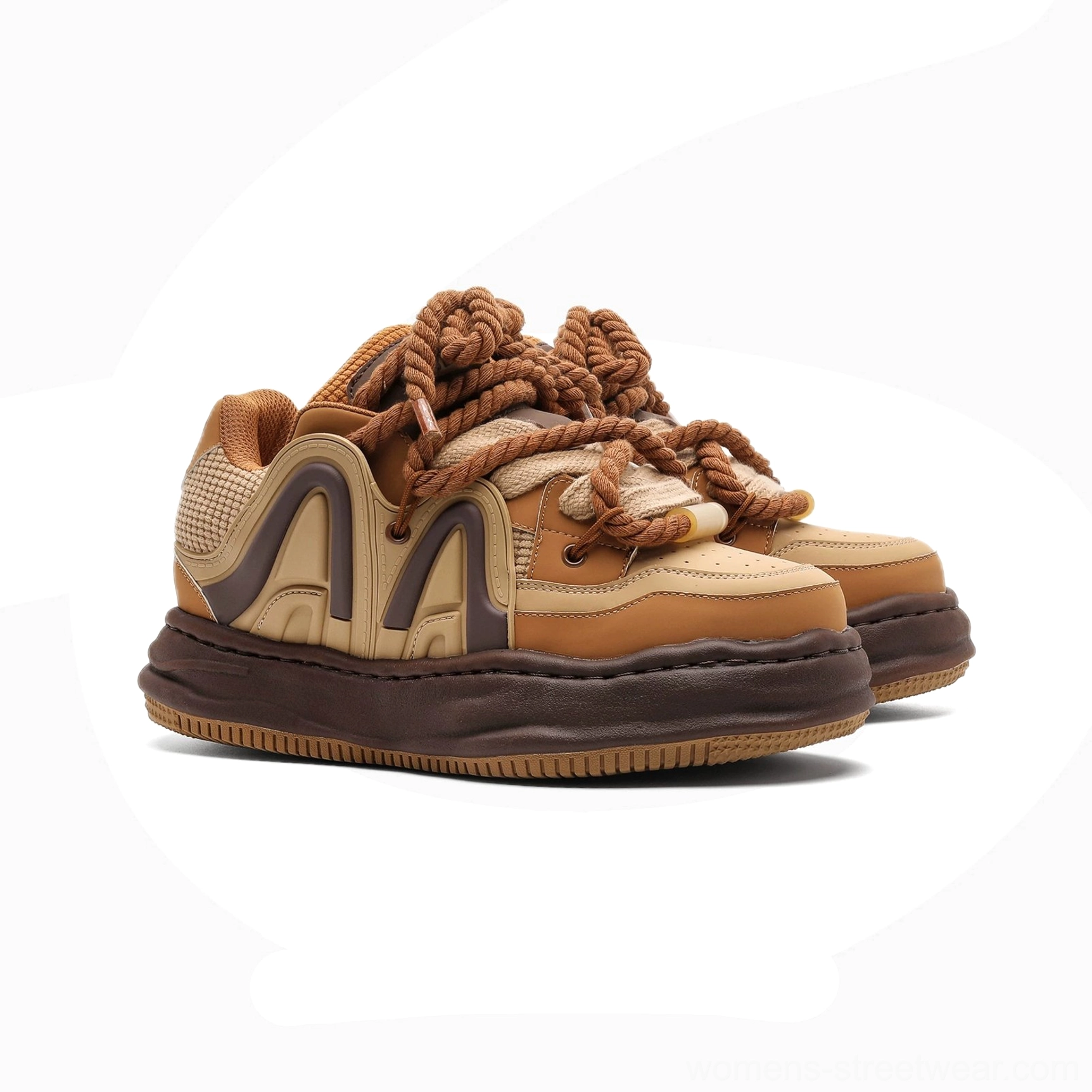 Chunky tan and dark brown platform sneakers with thick rope laces, rounded toe, dimensional side decoration, and sculpted elevated sole