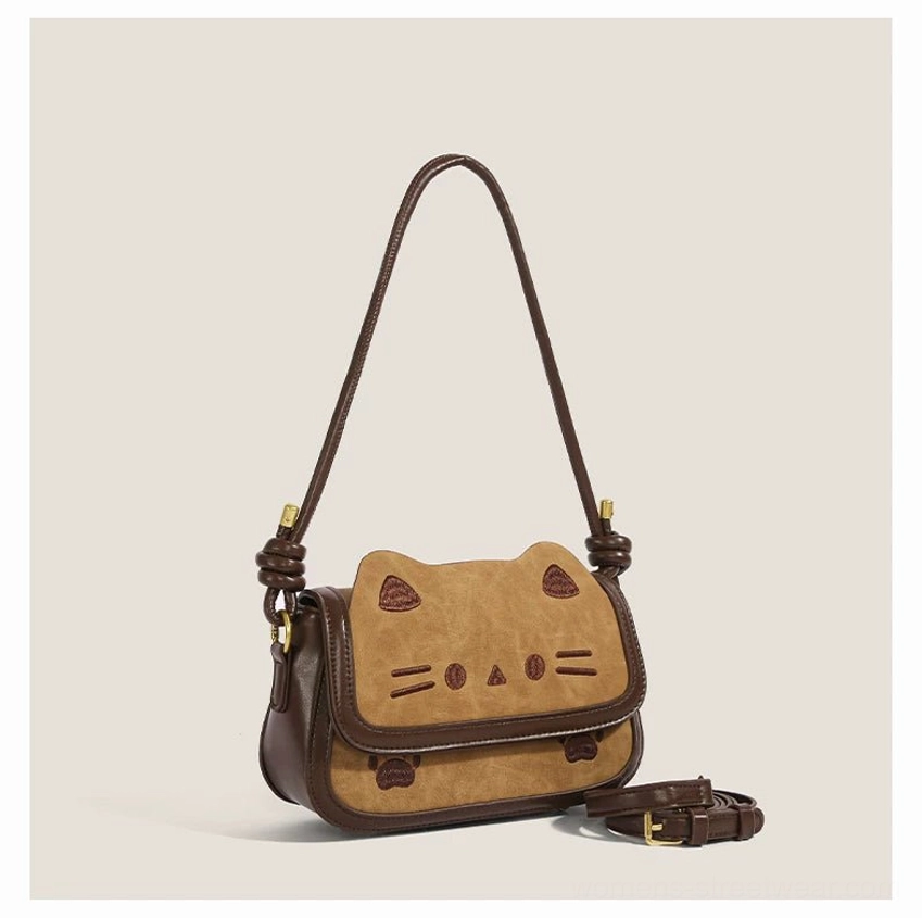 Khaki PU cat themed shoulder bag with embroidered paw details dark brown piping and detachable crossbody strap