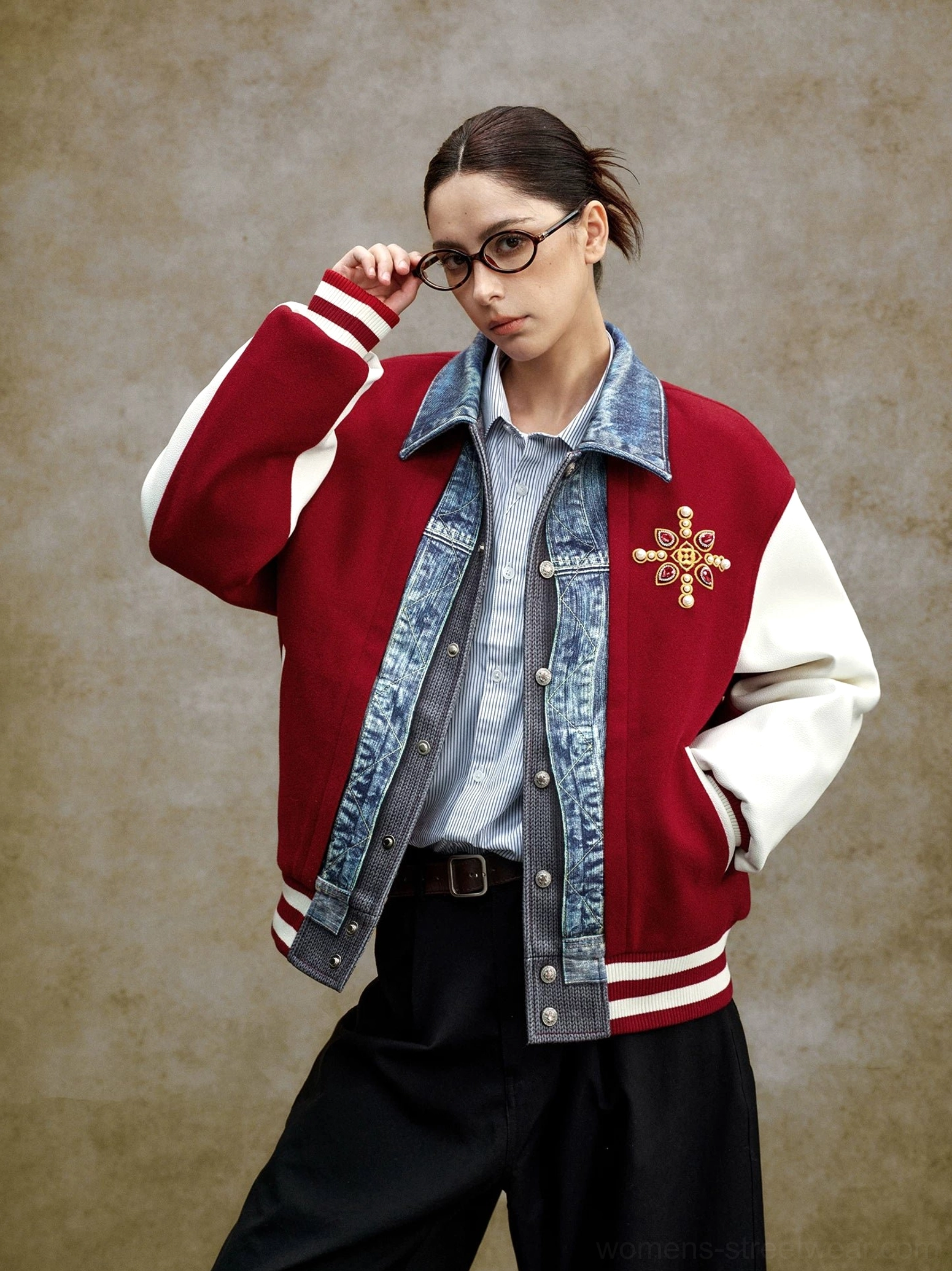 Claret denim panel embroidered varsity bomber jacket styled with a light blue shirt and wide-leg black trousers for a Korean streetwear outfit