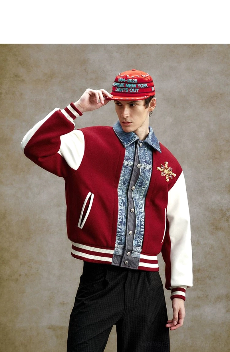Claret embroidered varsity bomber jacket styled with a red graphic cap, denim-effect collar, sleeve stripe, and striped ribbed trims