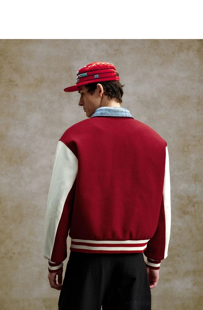Back view of claret varsity bomber jacket with contrasting white sleeves, solid back body, striped ribbed hem, and relaxed streetwear fit