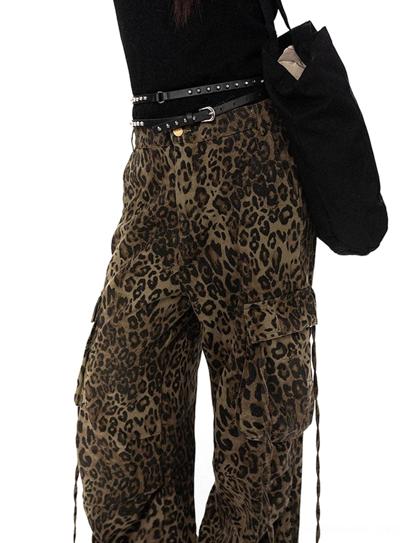 Close-up of high-waisted brown leopard print cargo pants showing zipper button closure cargo pocket and double studded belt styling