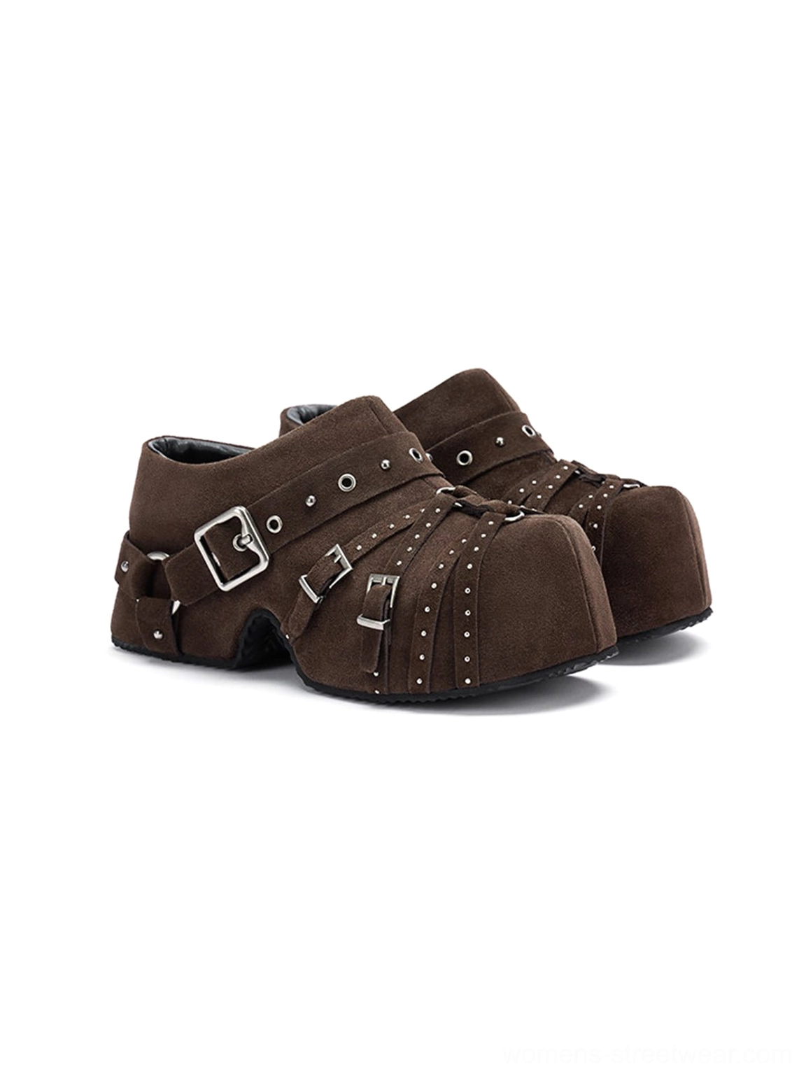 Closed-toe studded slip-on mules with layered buckles, chunky sole, and contemporary Y2K street style