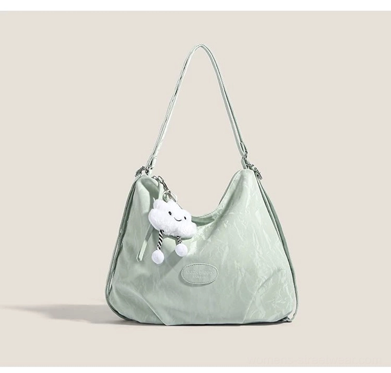 Sage green cloud charm crinkle convertible hobo shoulder bag with silver hardware and plush cloud pendant