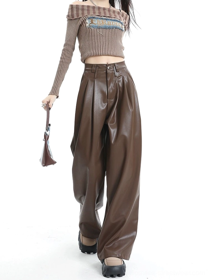 Side view of coffee brown high-waisted faux leather wide-leg streetwear pants with relaxed floor-length silhouette