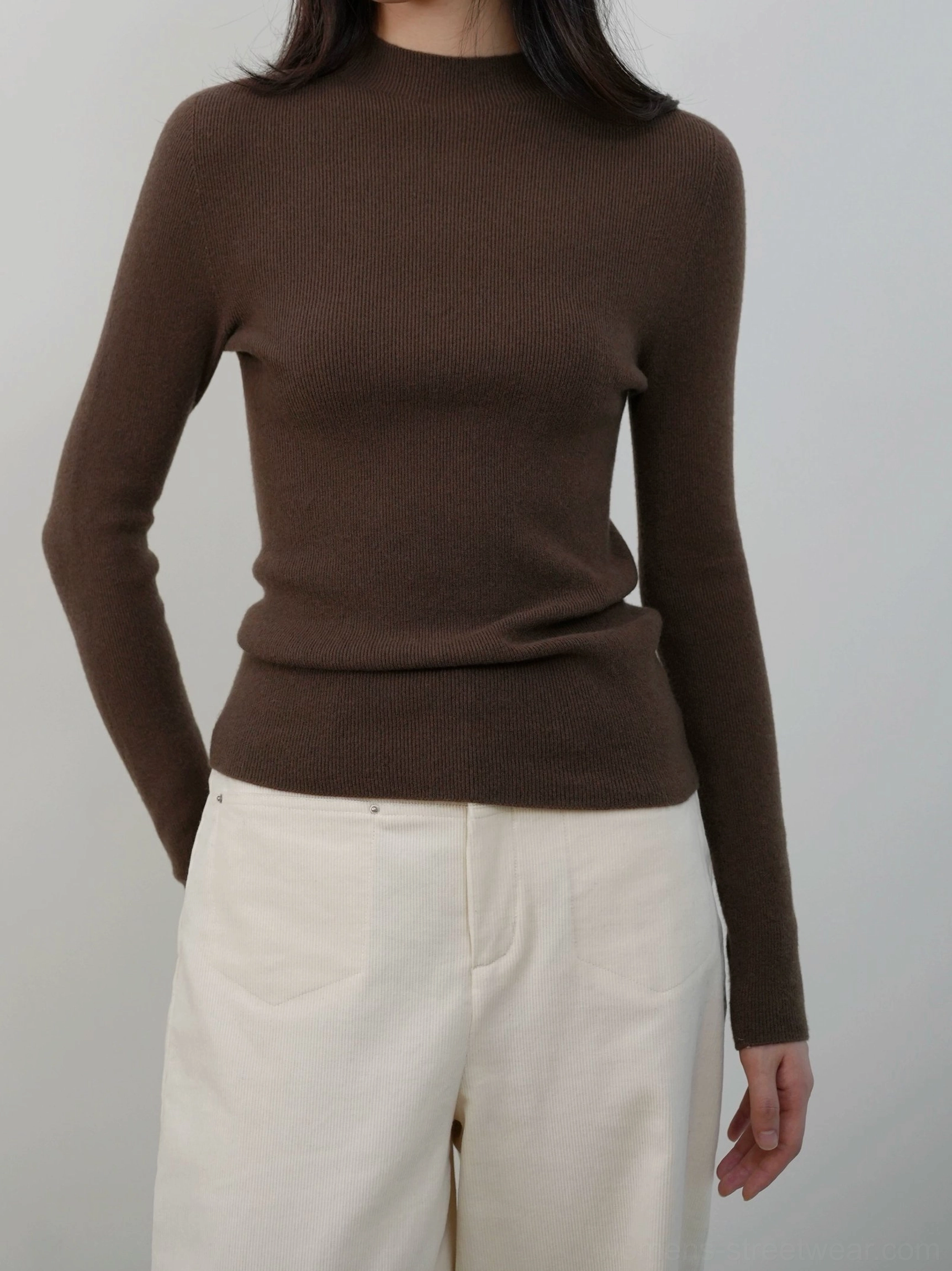 Coffee brown mock neck knit sweater for women with a fitted shape and lightweight ribbed layering texture