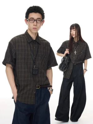 Male and female models wearing coffee vintage plaid short sleeve button shirt with wide leg denim streetwear outfits