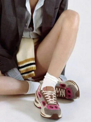 Chunky color-block running sneakers styled with white crew socks in a casual Korean streetwear outfit