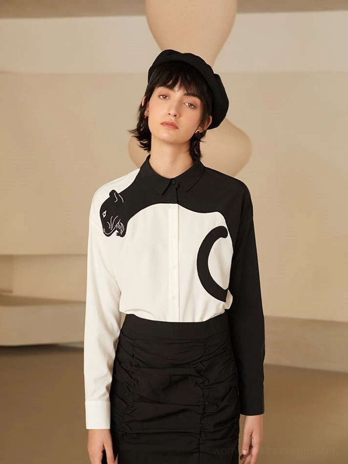 Full front view of color block panther embroidered shirt blouse with graphic chest motif and structured silhouette