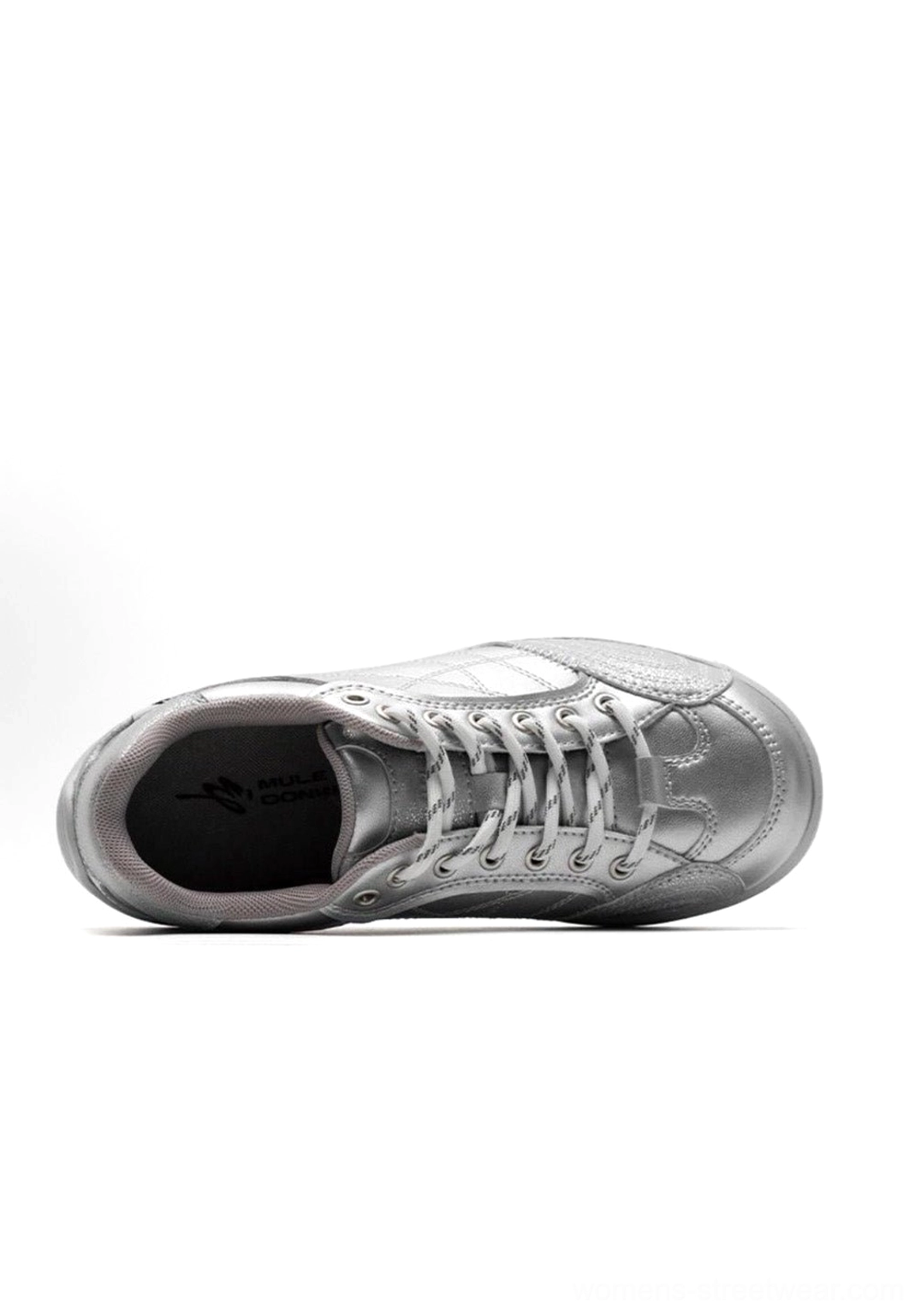 Fashion lookbook style photography featuring retro colorblock German trainer sneaker as centerpiece with styled streetwear ensemble and accessories