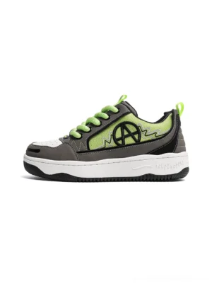 Green and charcoal colorblock graphic skate sneaker with neon laces white toe cap and alternative side logo