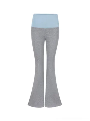 Flat lay view of colorblock fold-over waist flared pants with a slim silhouette and contrast waistband