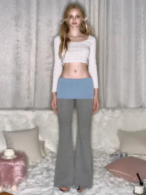 Front view of colorblock fold-over waist flared streetwear pants with a heather gray body and contrasting waistband