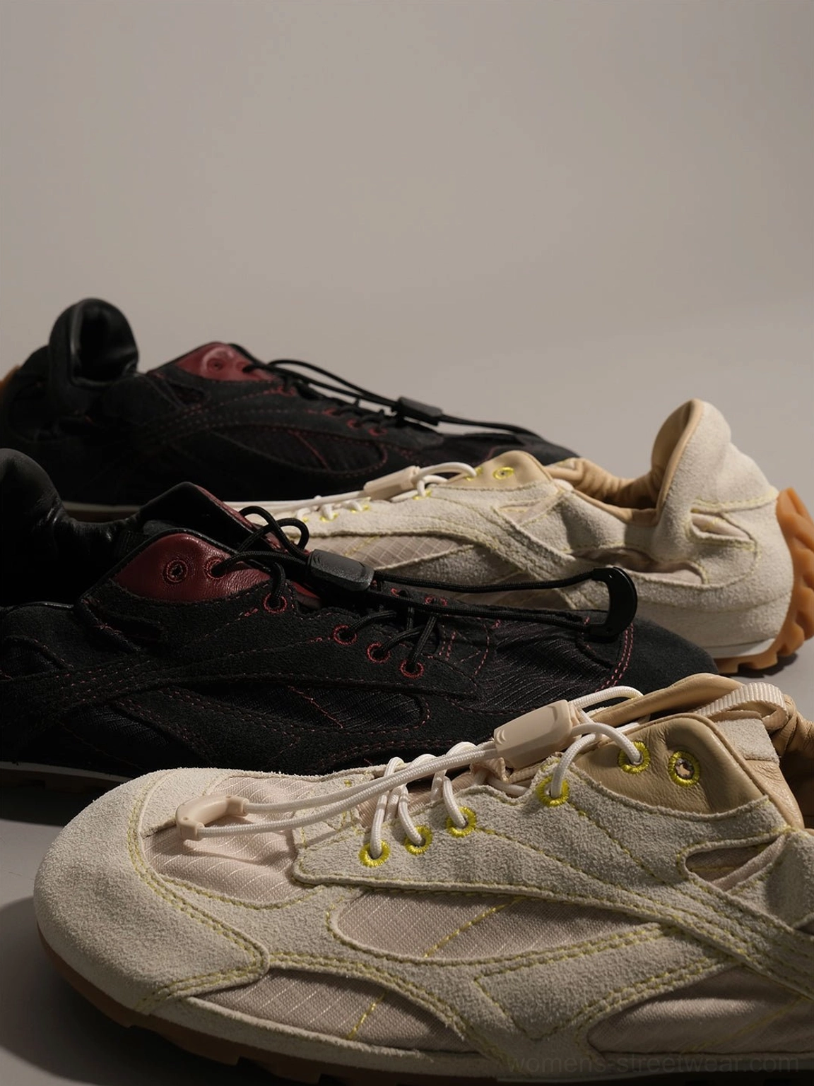 Contemporary Korean streetwear trainers with paneled leather and twill construction