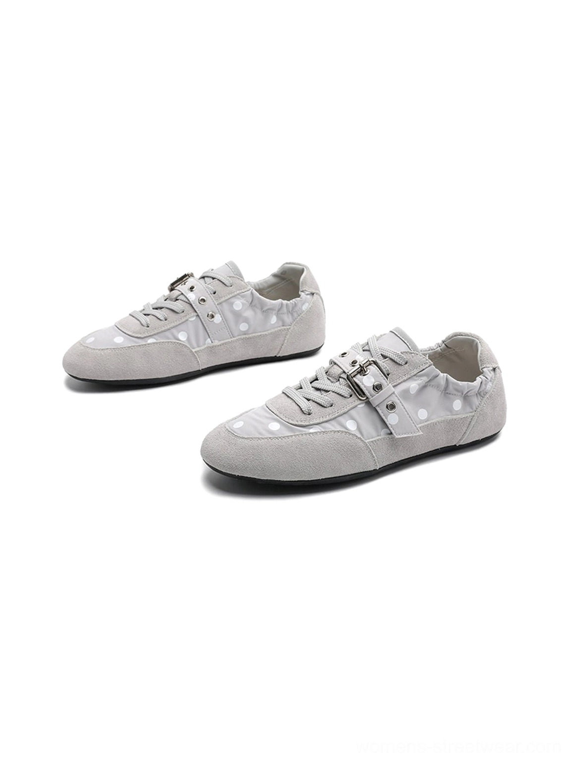 Contemporary ballet sneakers with polka dot textile upper, silver buckle fastening, and casual streetwear styling