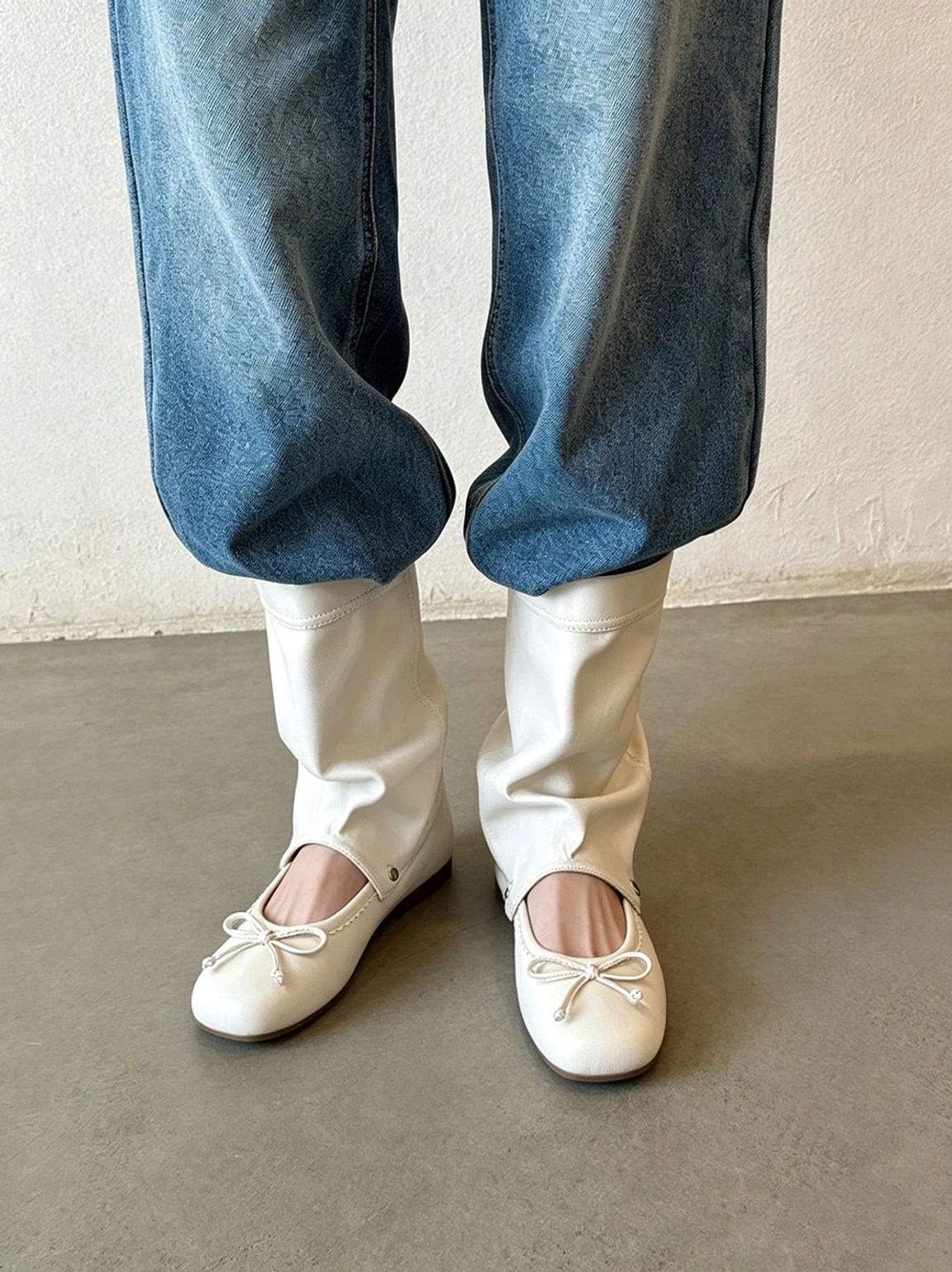 Convertible bow-wrap slouchy sandal boots close-up of rounded openwork toe and ballet-inspired low sole