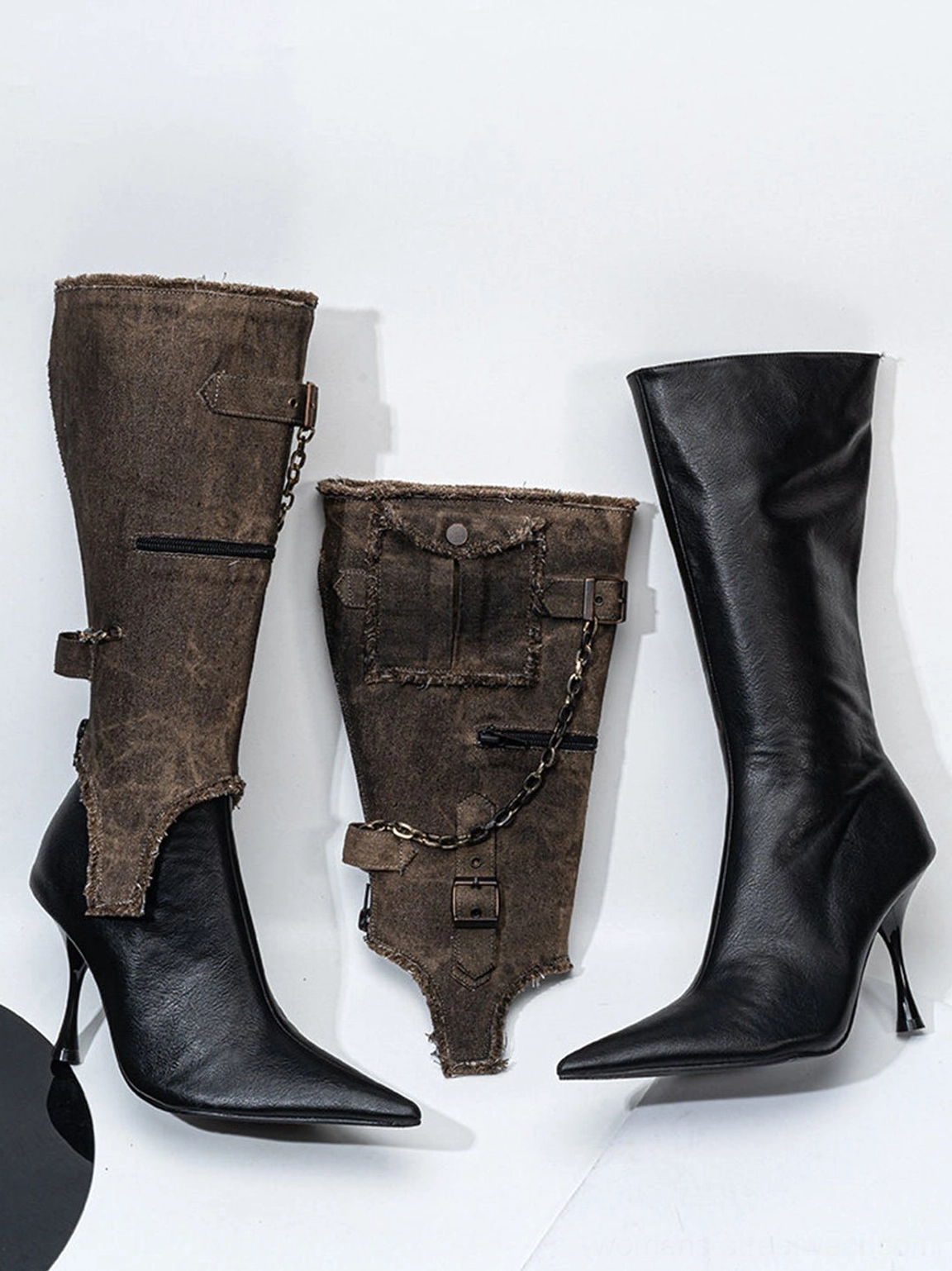 Black pointed toe stiletto boots with detachable distressed shaft for avant-garde Y2K streetwear styling