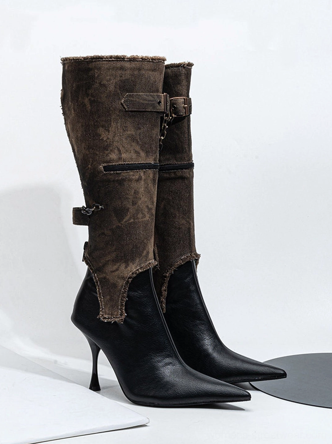 Distressed shaft black pointed stiletto boots designed for dark feminine outfits and elevated streetwear looks