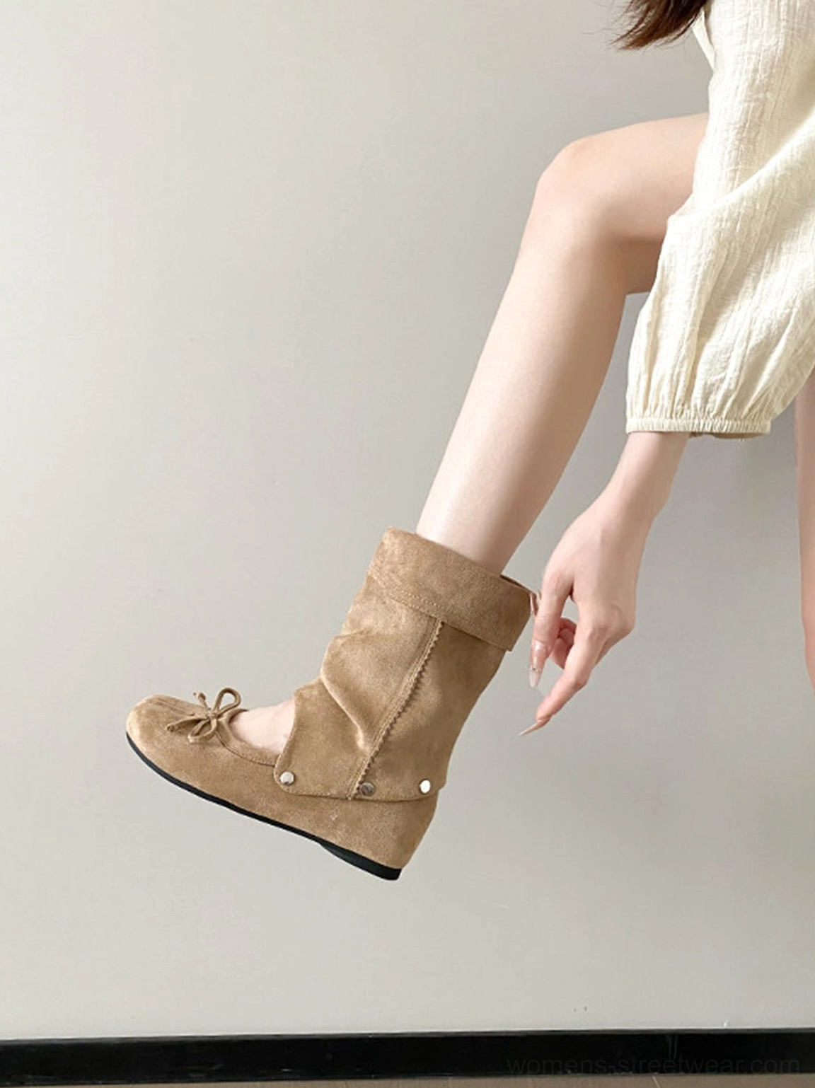 Convertible tabi ballet sandal boots showcasing low-profile flexible sole and detachable studded boot cuff