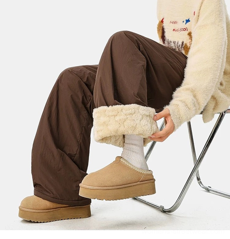 Convertible winter streetwear pants with warm faux-fur fleece lining, loose wide legs, and versatile urban styling