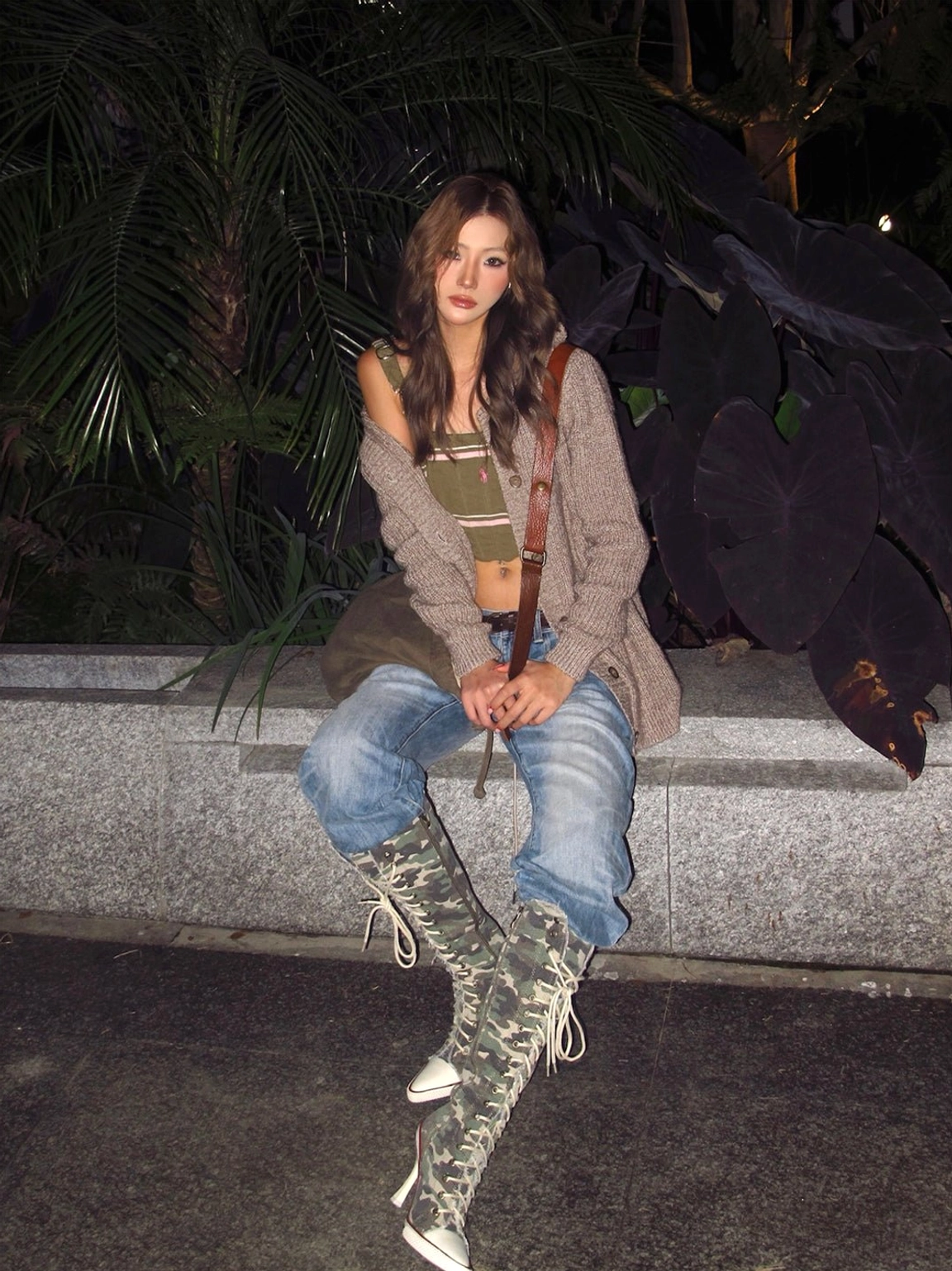 Corset lace-up knee-high stiletto boots in black or camouflage with distressed textile construction and contrast pointed toes