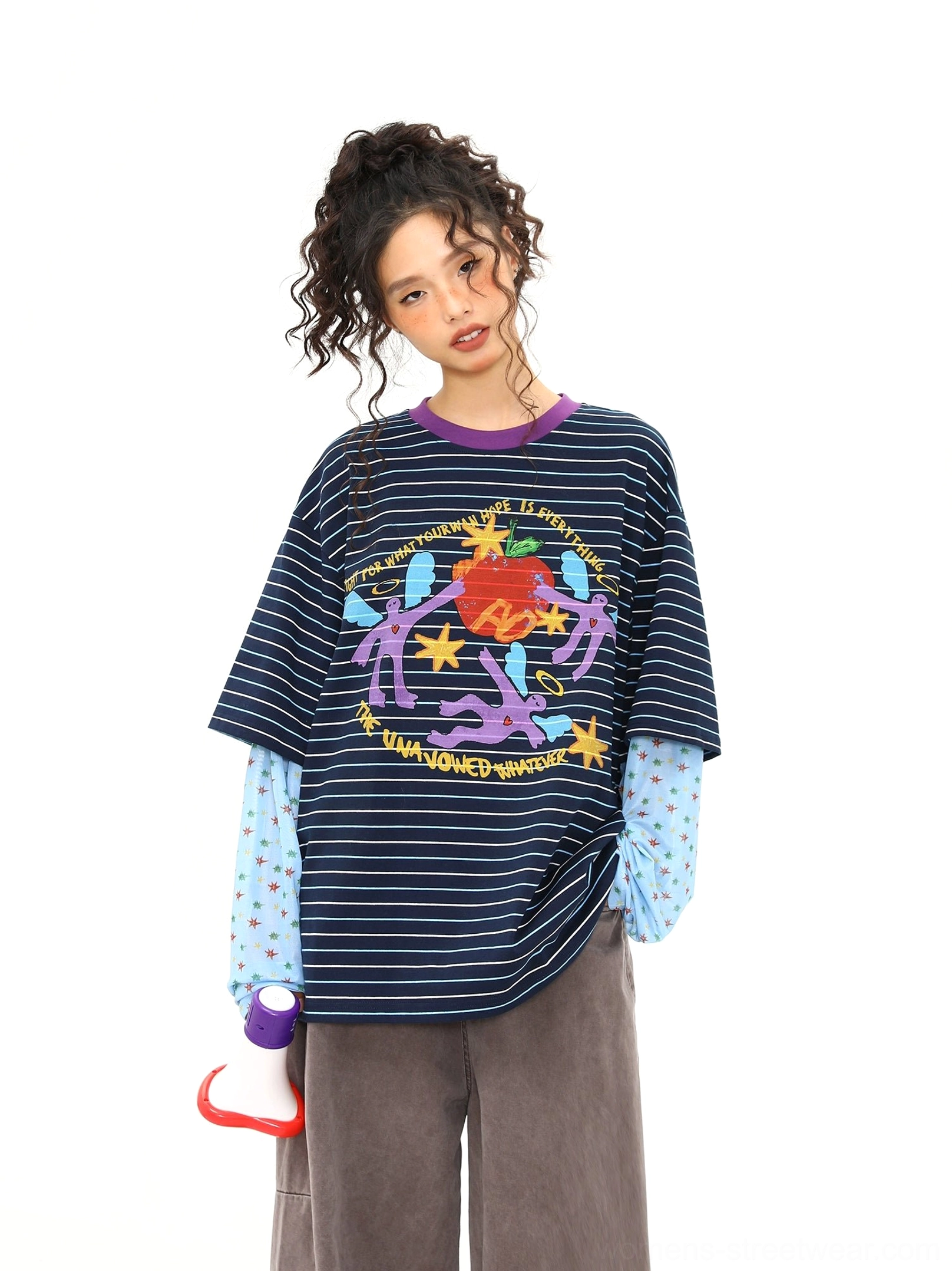 Blue oversized striped graphic long sleeve tee with purple contrast collar, light blue polka dot sleeves, and colorful cartoon streetwear print