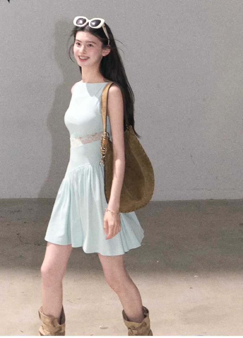 Cotton stretch asymmetrical lace waist dress with sleeveless silhouette and comfortable fitted upper body