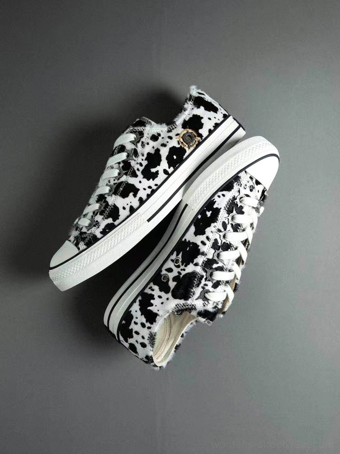 Cowhide low-profile sneakers in expressive retro streetwear colorways with textured leather panels, contrast laces, and vulcanized rubber soles
